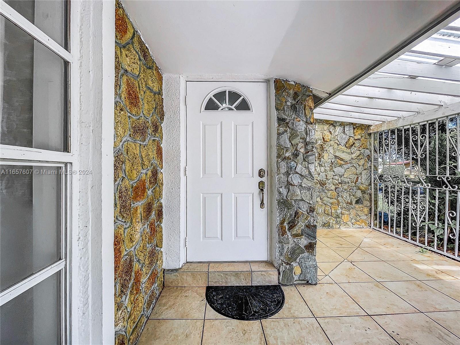 8218 Southampton Drive Miramar, FL 33025 - Photo 3 of 28 a view of a entryway door of the house