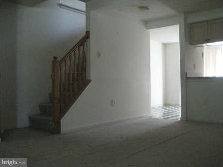 7811 Paddock Way Baltimore, MD 21244 - Photo 5 of 15 a view of entryway and hall with wooden floor