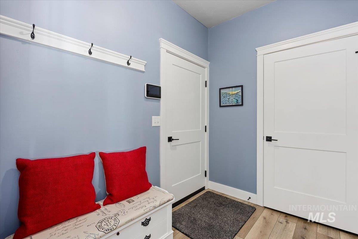 1436 Jump Street Twin Falls, ID 83301 - Photo 24 of 35 Mudroom with light wood-type flooring and baseboards