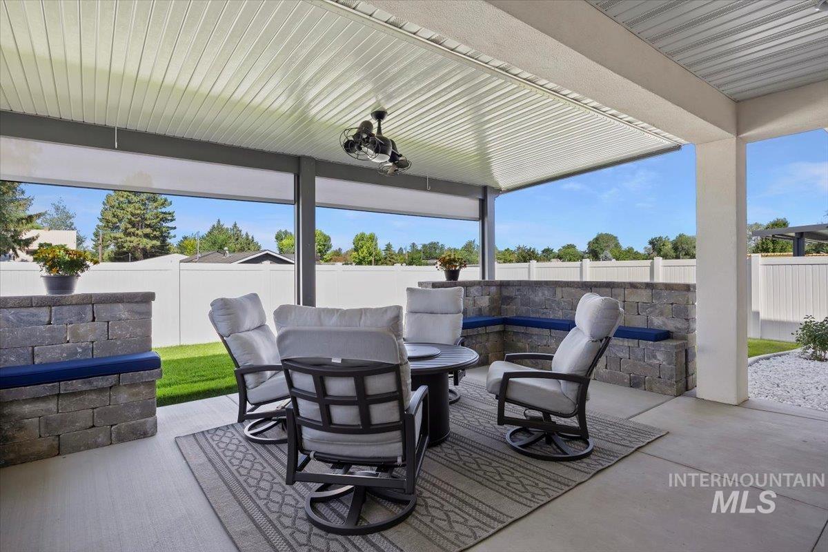 1436 Jump Street Twin Falls, ID 83301 - Photo 26 of 35 Fenced backyard with a patio area and an outdoor living space