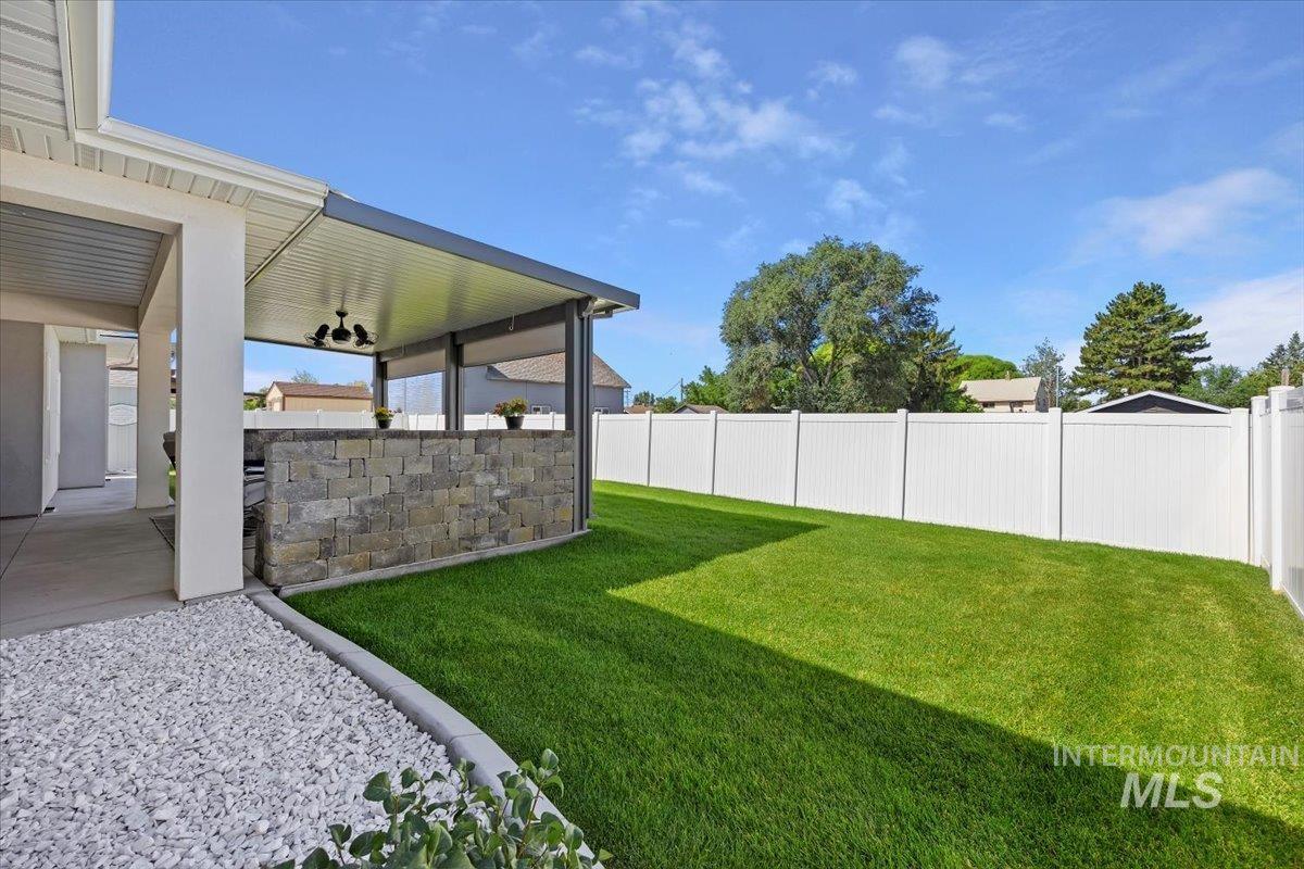 1436 Jump Street Twin Falls, ID 83301 - Photo 30 of 35 Fenced backyard featuring a patio