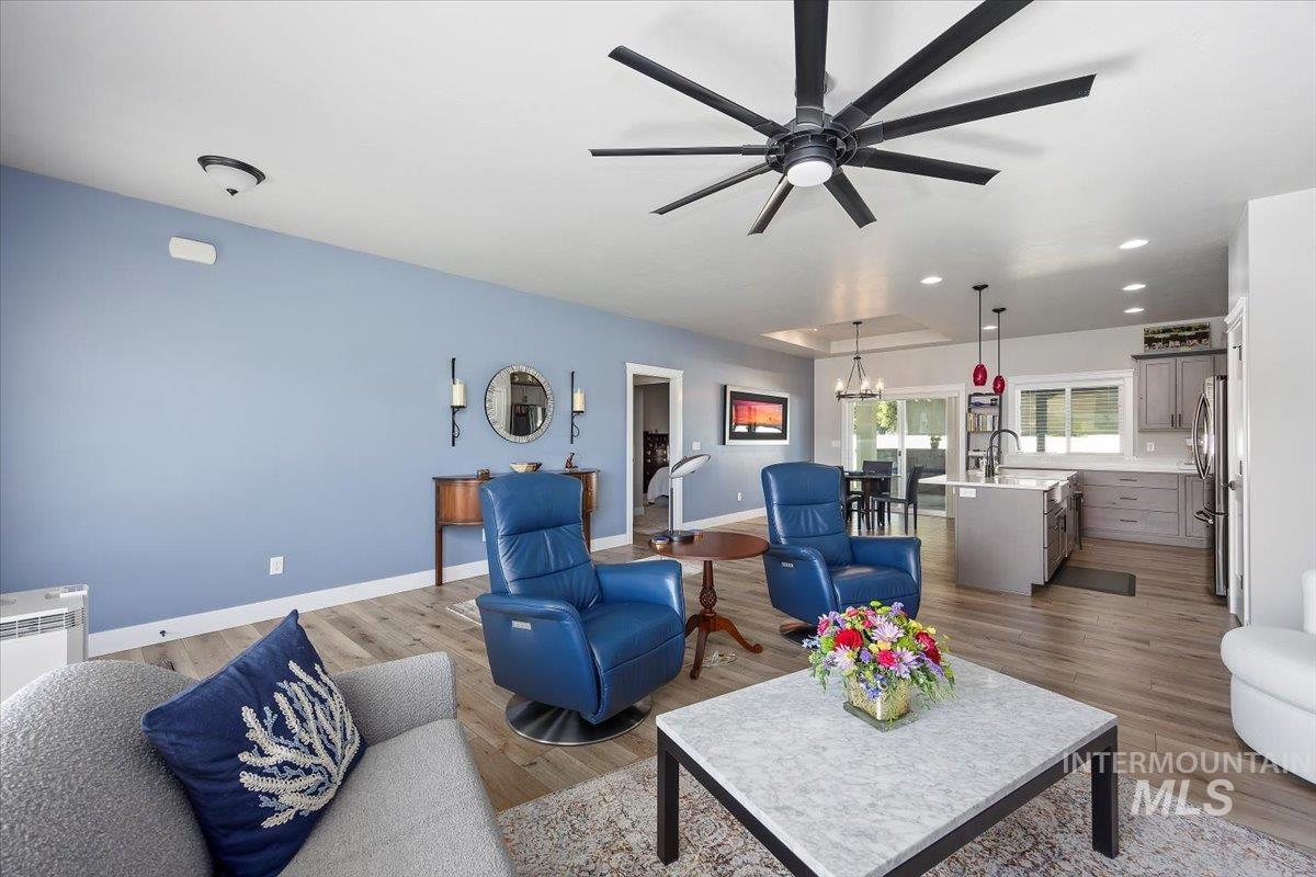 1436 Jump Street Twin Falls, ID 83301 - Photo 6 of 35 Living area with ceiling fan, recessed lighting, a chandelier, and wood finished floors