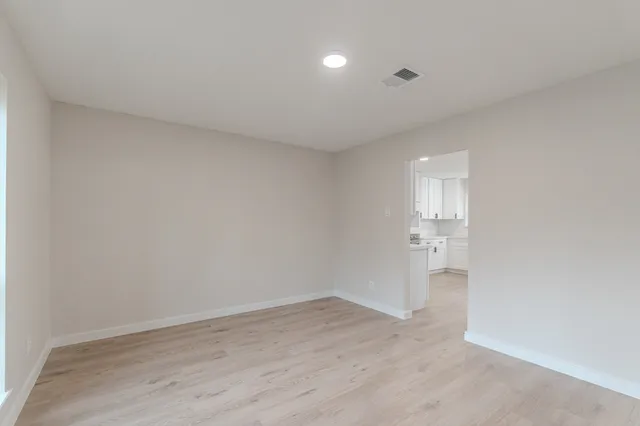 a bathroom with a double vanity sink mirror and