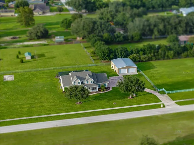 a view of a golf course with a garden