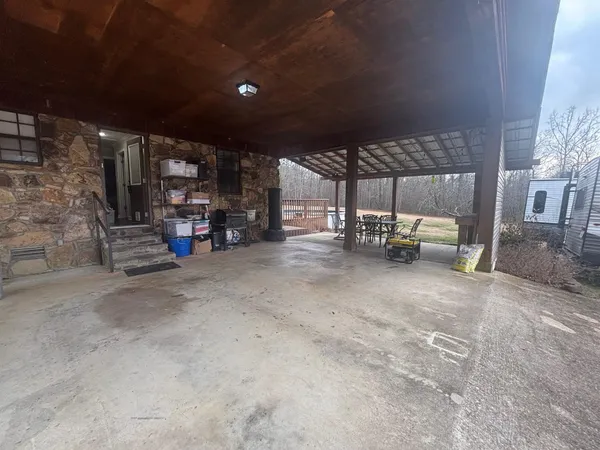 a kitchen with stainless steel appliances granite countertop a refrigerator and a stove