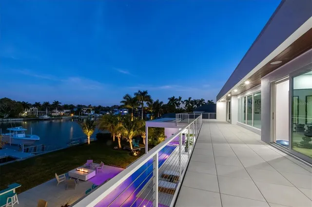 a aerial view of a house with a lake view