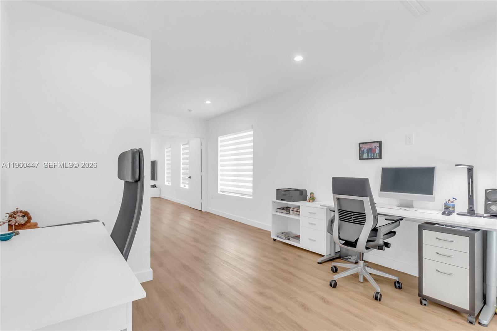 2029 Southwest 62nd Avenue Miami, FL 33155 - Photo 32 of 43 a view of a workspace with furniture and a window