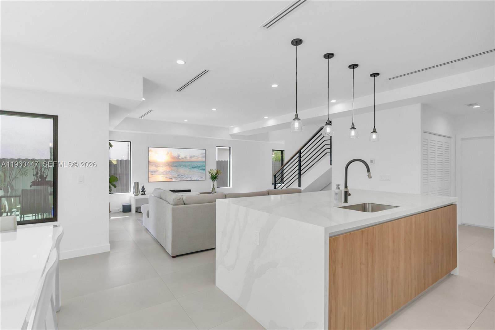 2029 Southwest 62nd Avenue Miami, FL 33155 - Photo 7 of 43 a kitchen with refrigerator and sink