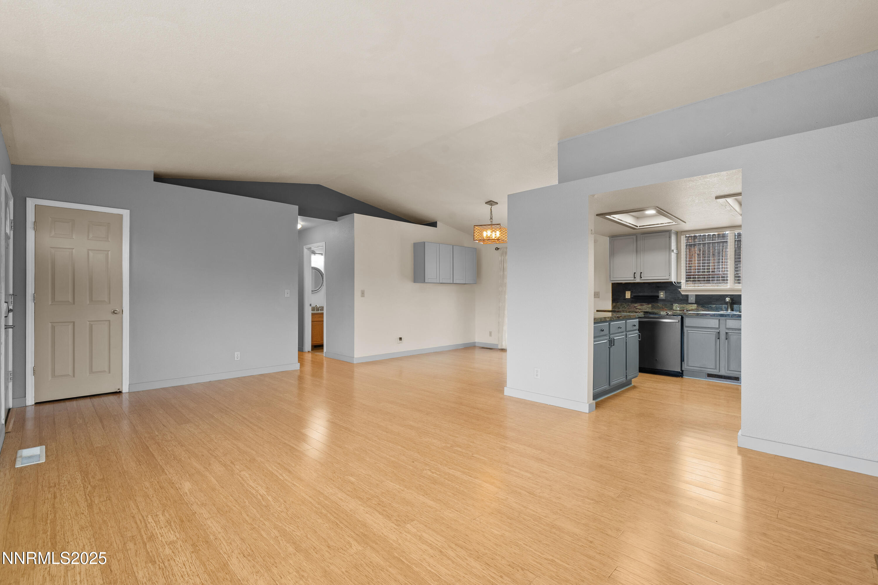 997 Ridgeview Drive Carson City, NV 89705 - Photo 8 of 32 a view of a kitchen with a sink and a stove top oven