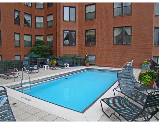390 Commonwealth Avenue, Unit 710 Boston, MA 02215 - Photo 11 of 14 a swimming pool with outdoor seating and yard
