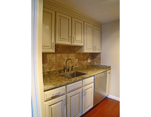 390 Commonwealth Avenue, Unit 710 Boston, MA 02215 - Photo 7 of 14 a kitchen with a sink and cabinets