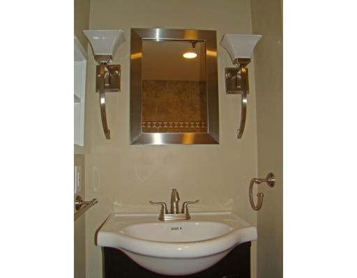 390 Commonwealth Avenue, Unit 710 Boston, MA 02215 - Photo 10 of 14 a bathroom with a sink and a mirror