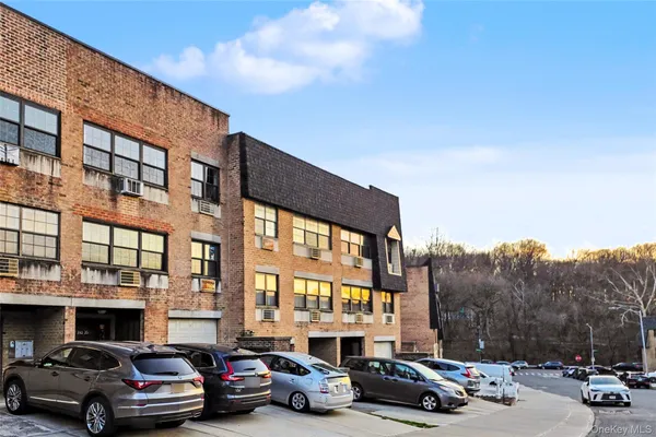 a view of a car parked in front of a building