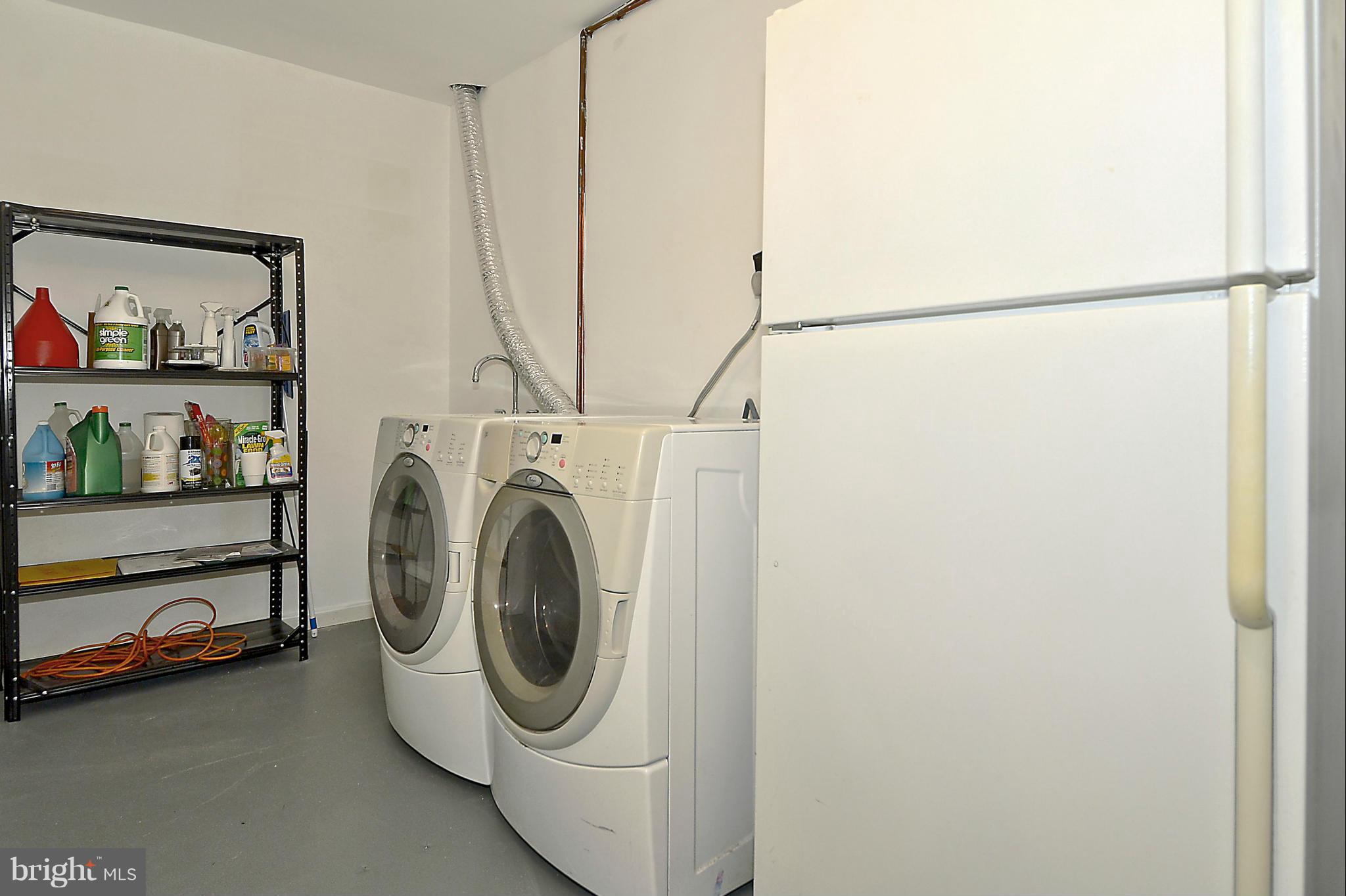 3721 Ferrara Drive Silver Spring, MD 20906 - Photo 21 of 30 Large laundry room with sink, storage