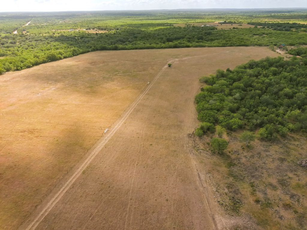 446 County Road 446 Waelder, TX 78959 - Photo 16 of 25 a view of an ocean beach and mountain