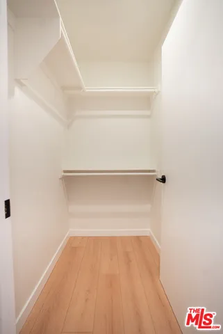 a bathroom with a sink mirror toilet and bathtub