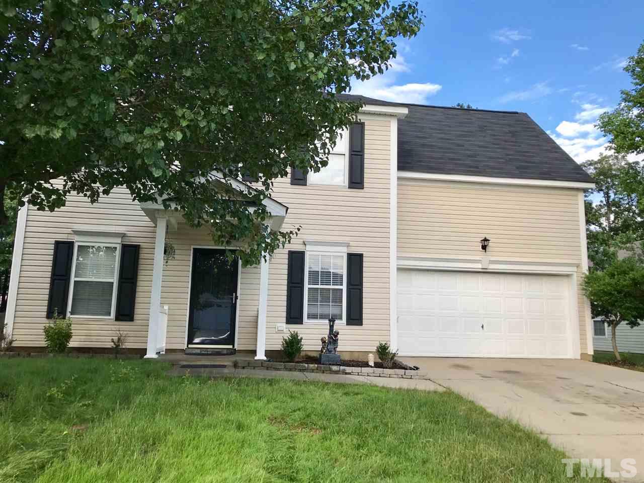 8612 Neuse Hunter Drive Raleigh, NC 27616 - Photo 1 of 23 front view of a house with a yard