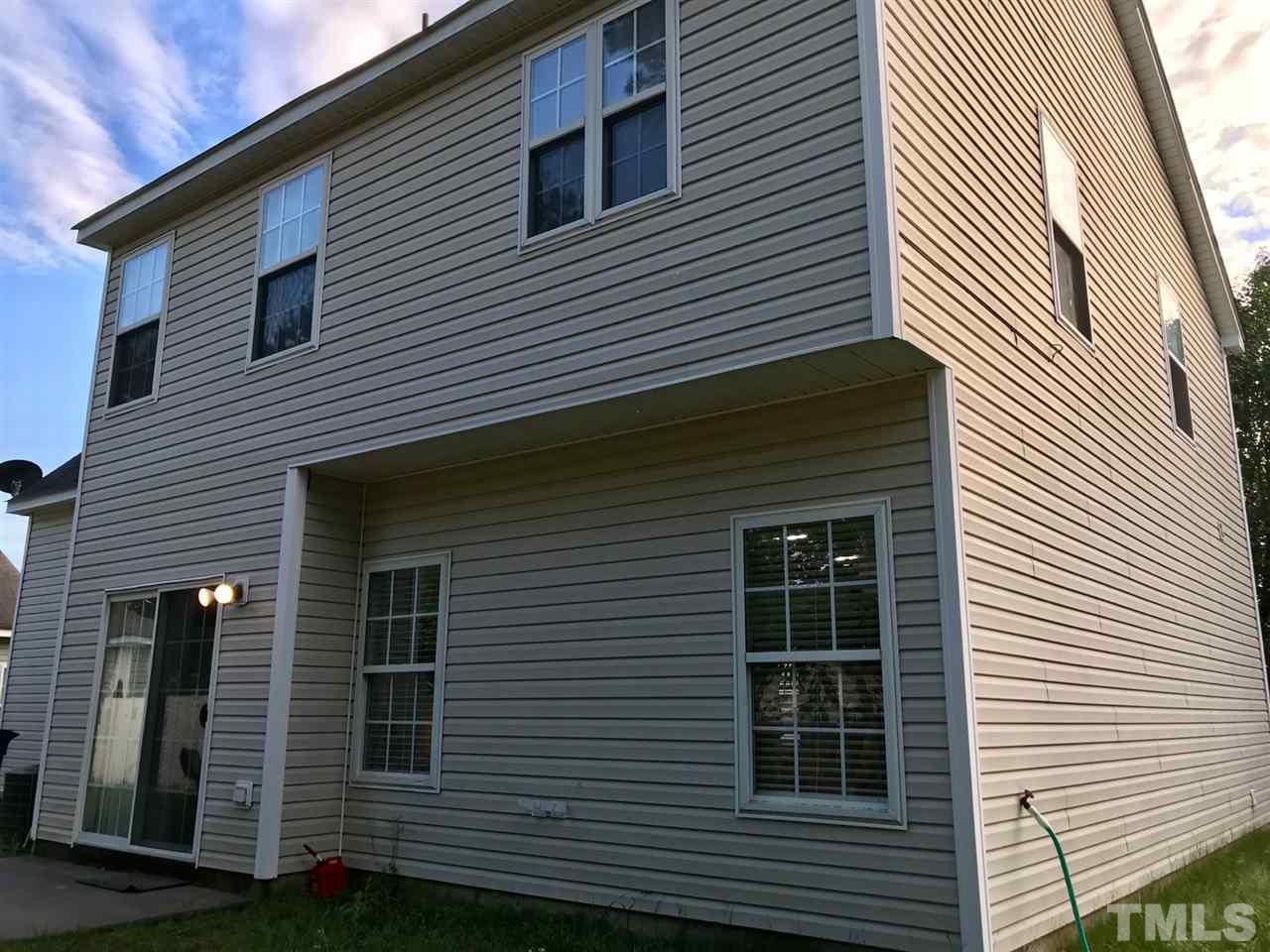 8612 Neuse Hunter Drive Raleigh, NC 27616 - Photo 22 of 23 a front view of a house