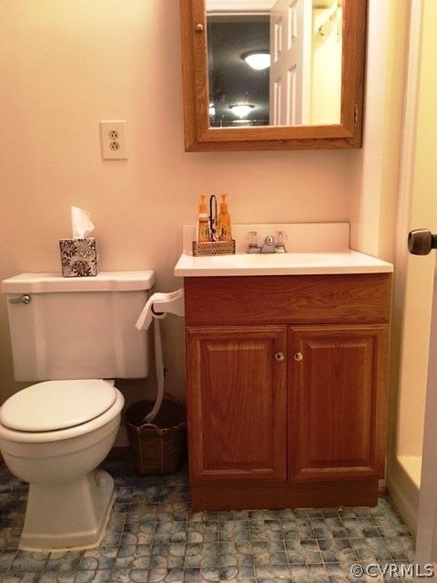 11420 Chalkley Road Chester, VA 23831 - Photo 14 of 43 a bathroom with a toilet and a sink