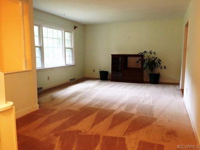 11420 Chalkley Road Chester, VA 23831 - Photo 15 of 43 a living room with a bed