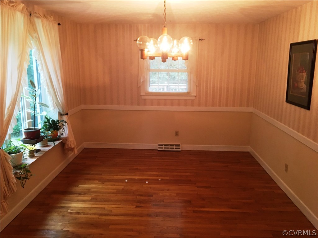 11420 Chalkley Road Chester, VA 23831 - Photo 17 of 43 a view of a livingroom with wooden floor and a window