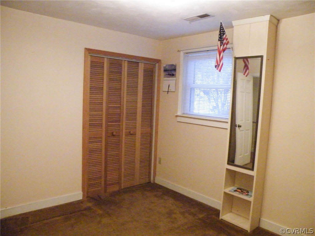 11420 Chalkley Road Chester, VA 23831 - Photo 27 of 43 an empty room with windows