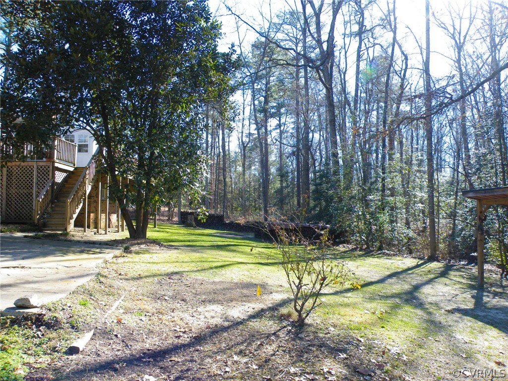 11420 Chalkley Road Chester, VA 23831 - Photo 32 of 43 a view of a yard with swimming pool