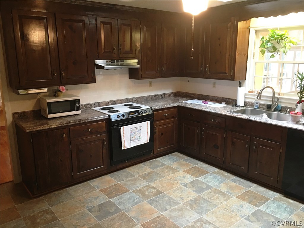 11420 Chalkley Road Chester, VA 23831 - Photo 4 of 43 a kitchen with a sink stove and cabinets