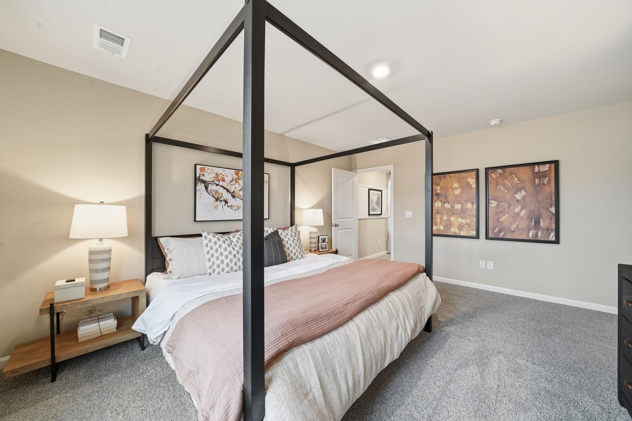 109 Meadow Ridge Way Staunton, VA 24401 - Photo 16 of 29 a bedroom with a bed a mirror and a window