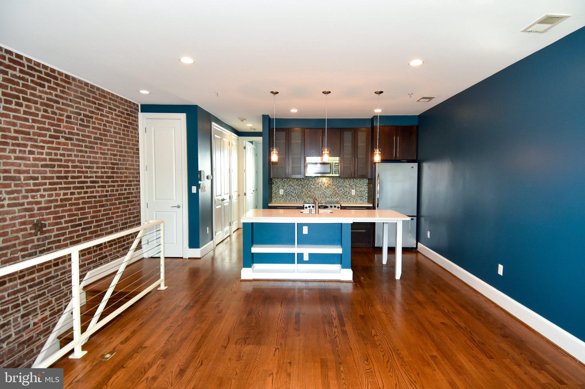 1316 9th Street Northwest Washington, DC 20001 - Photo 21 of 44 Chic urban loft with exposed brick.