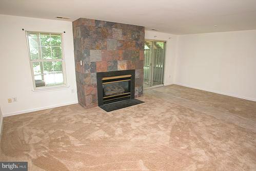 3546 Corn Stream Road Randallstown, MD 21133 - Photo 13 of 21 a view of empty room with a fireplace