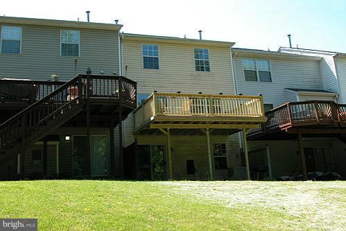 3546 Corn Stream Road Randallstown, MD 21133 - Photo 14 of 21 a front view of a house with a yard