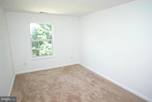 3546 Corn Stream Road Randallstown, MD 21133 - Photo 7 of 21 an empty room with a window