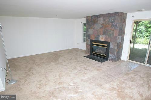 3546 Corn Stream Road Randallstown, MD 21133 - Photo 9 of 21 a view of empty room with a fireplace