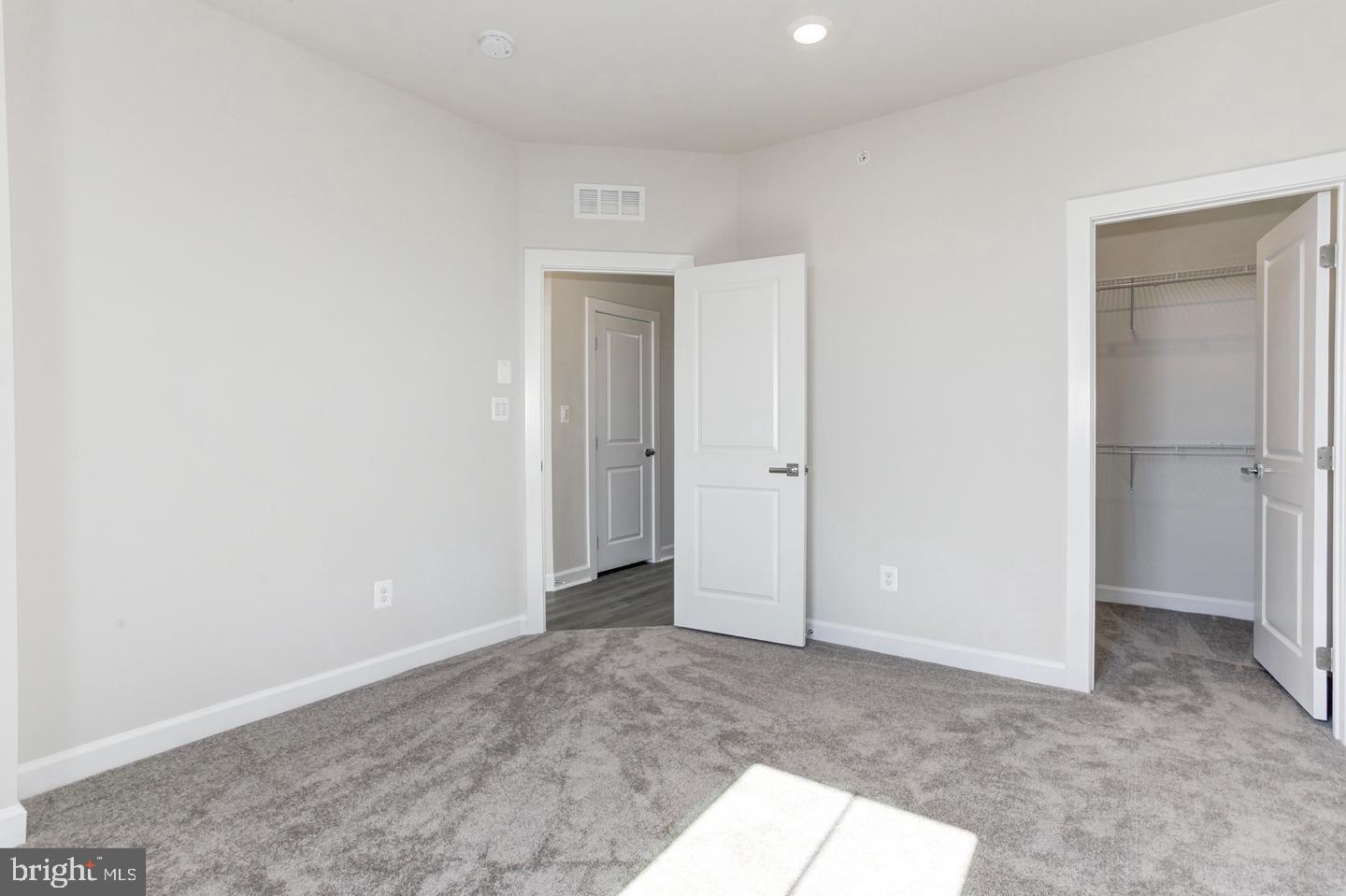 12923 Sunrise Ridge Alley Herndon, VA 20171 - Photo 15 of 25 a view of an empty room