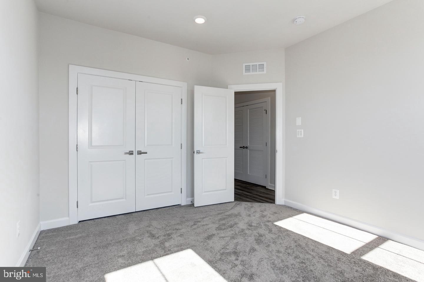 12923 Sunrise Ridge Alley Herndon, VA 20171 - Photo 20 of 25 a view of an empty room
