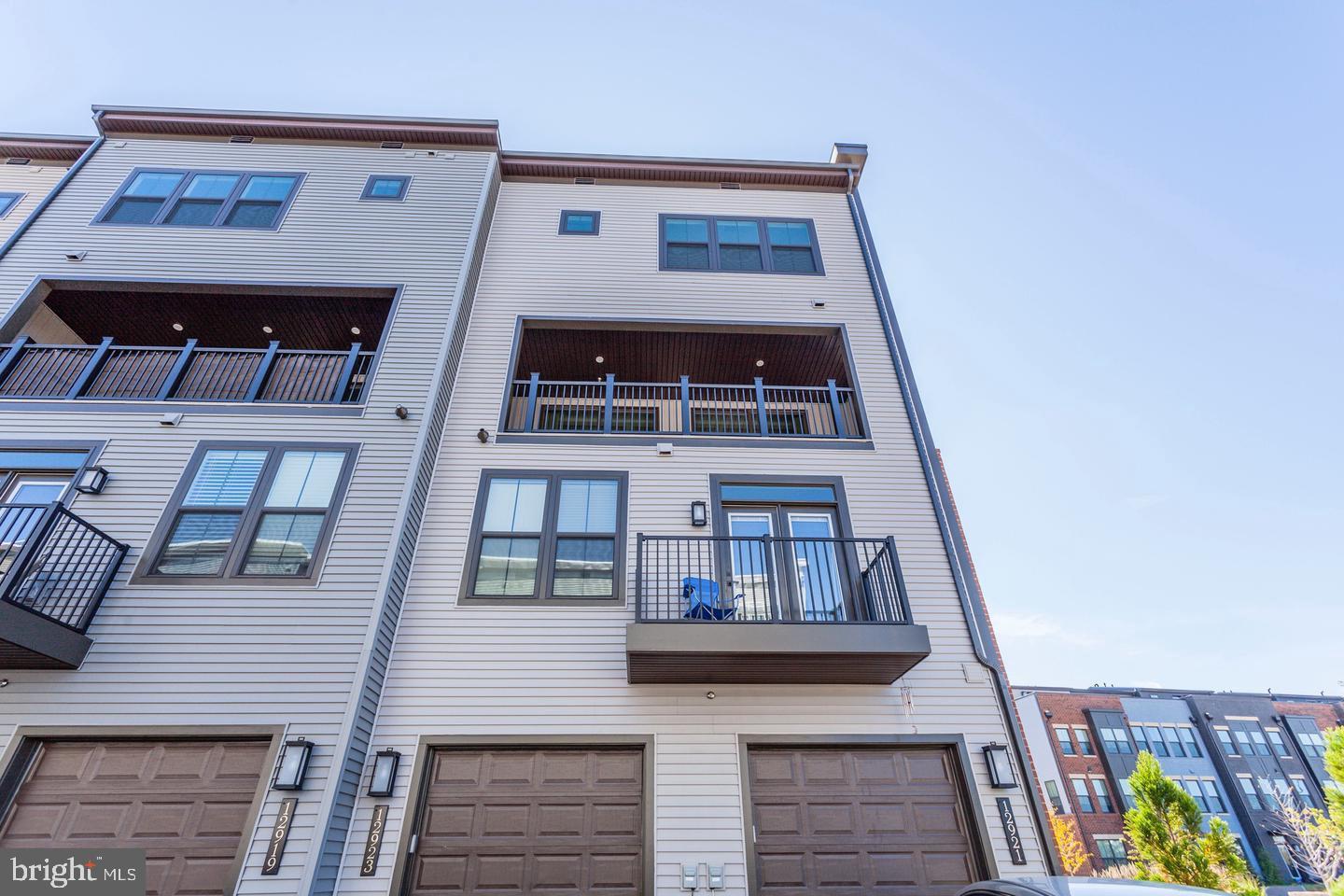 12923 Sunrise Ridge Alley Herndon, VA 20171 - Photo 24 of 25 a front view of a building