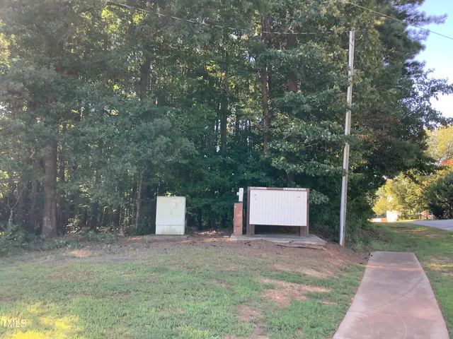 a view of a room with a tree and a yard