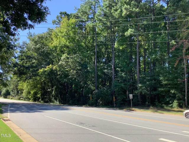 a view of a yard and a trees
