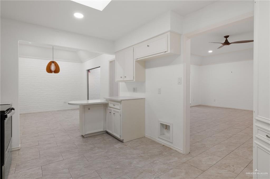 409 Tyler Avenue McAllen, TX 78503 - Photo 14 of 21 a view of a kitchen with a sink