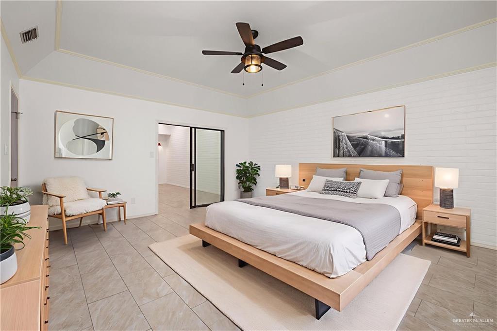 409 Tyler Avenue McAllen, TX 78503 - Photo 15 of 21 a bedroom with a bed and window