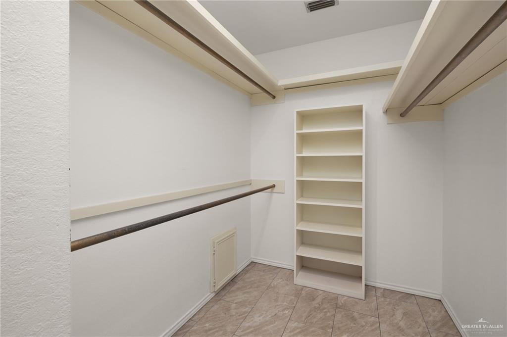 409 Tyler Avenue McAllen, TX 78503 - Photo 18 of 21 a view of an empty walk in closet