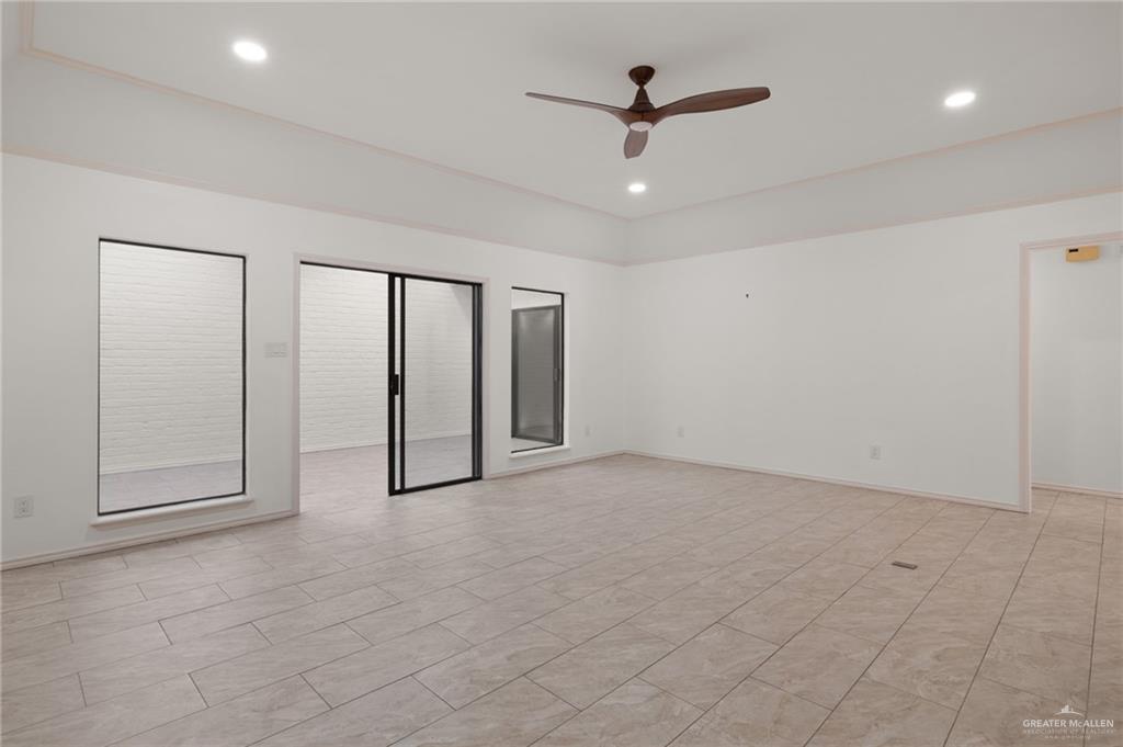 409 Tyler Avenue McAllen, TX 78503 - Photo 7 of 21 a view of an empty room with a window