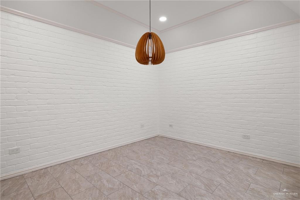 409 Tyler Avenue McAllen, TX 78503 - Photo 9 of 21 a bathroom with a shower