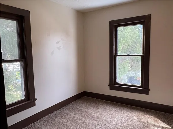 a view of an empty room with window