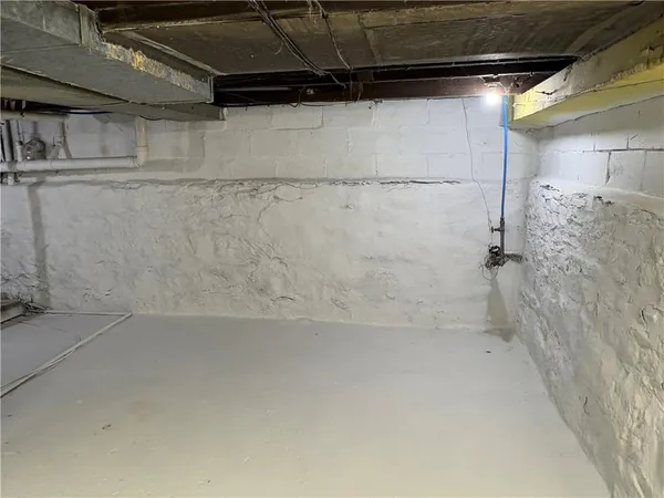 a view of a room with wooden walls