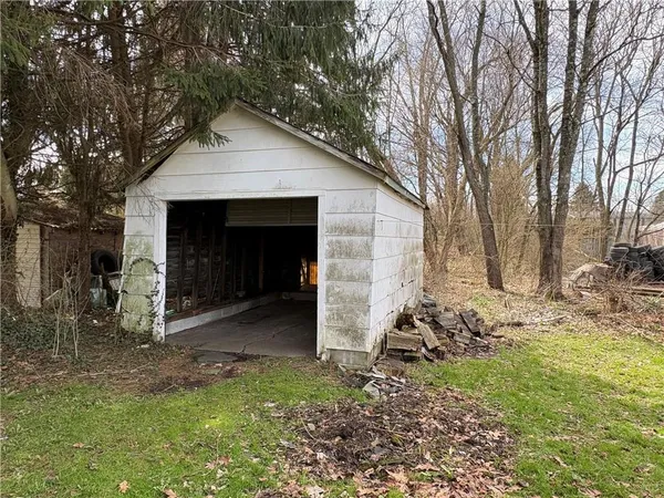a view of a backyard of the house