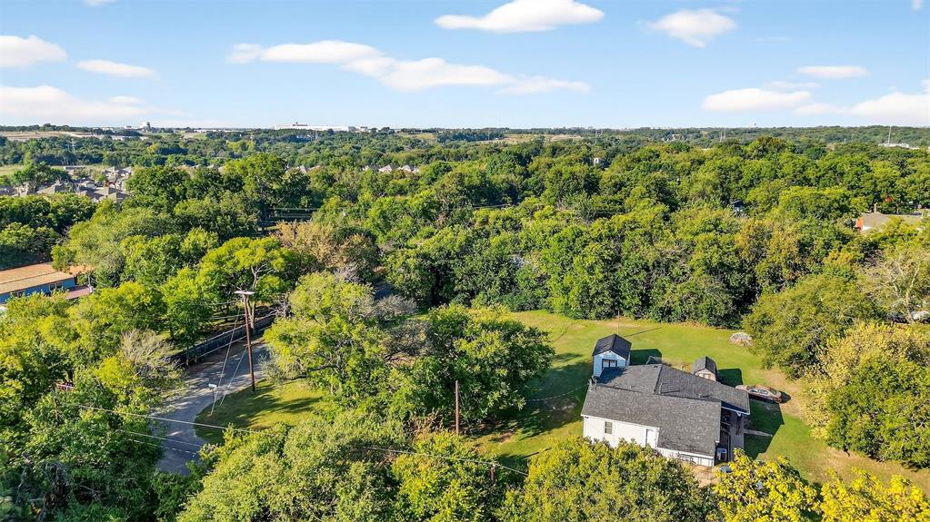 2018 South Inwood Street Sherman, TX 75090 - Photo 2 of 22 an aerial view of a house with a yard
