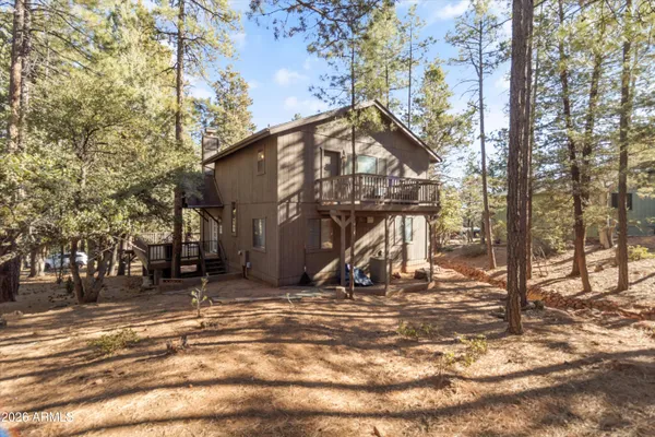 a view of a house with snow on the ground