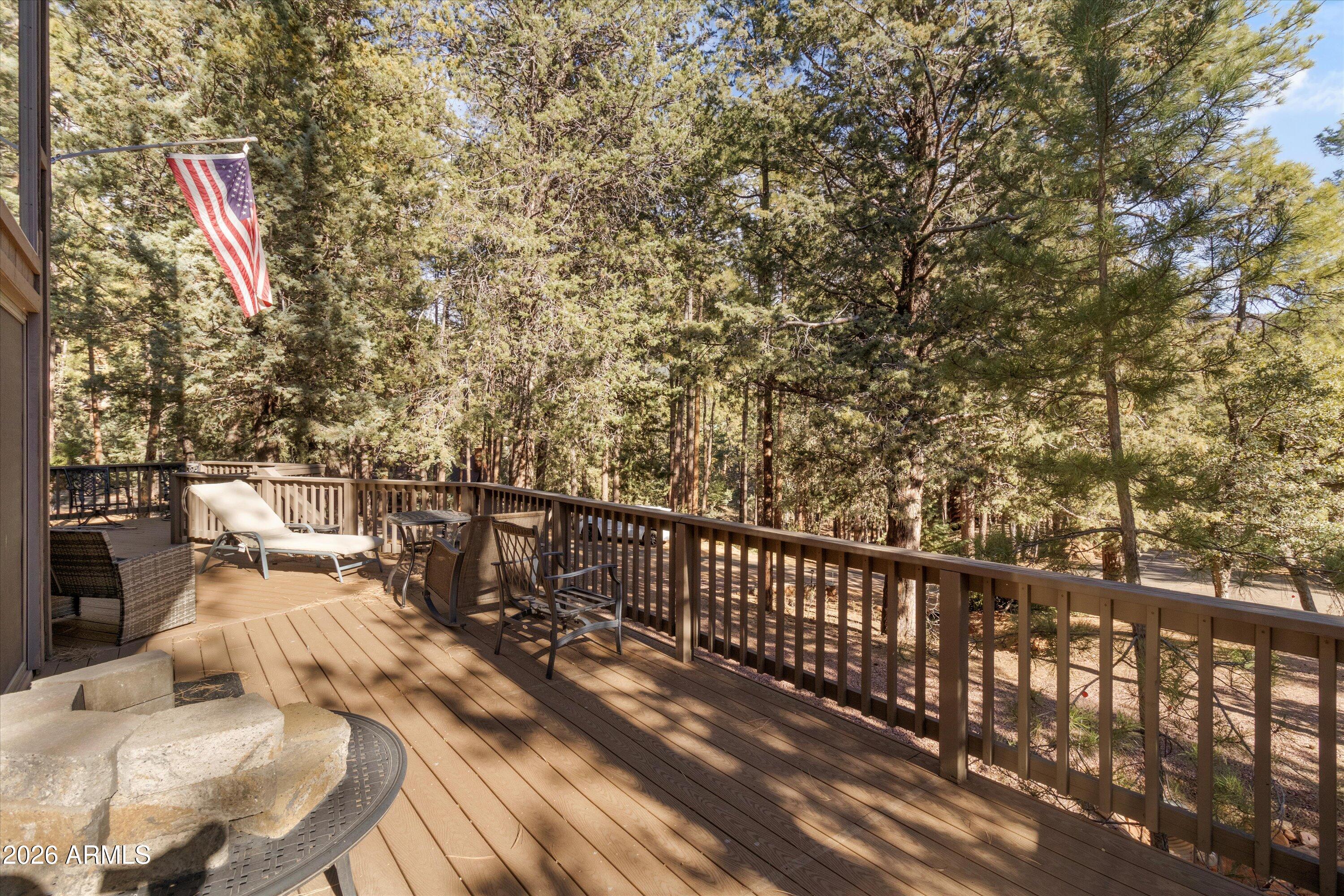 6181 Pinon Loop Pine, AZ 85544 - Photo 25 of 36 a view of balcony with wooden floor and seating space